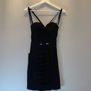 Laced Up Front Buster Dress in Black. SIZE US00